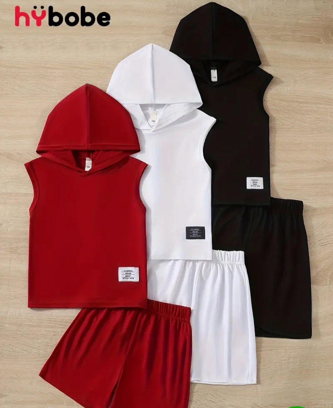 Boys 3-Piece Outfit Set featuring sleeveless hooded tops in red, white, and black, paired with matching shorts for comfy summer style