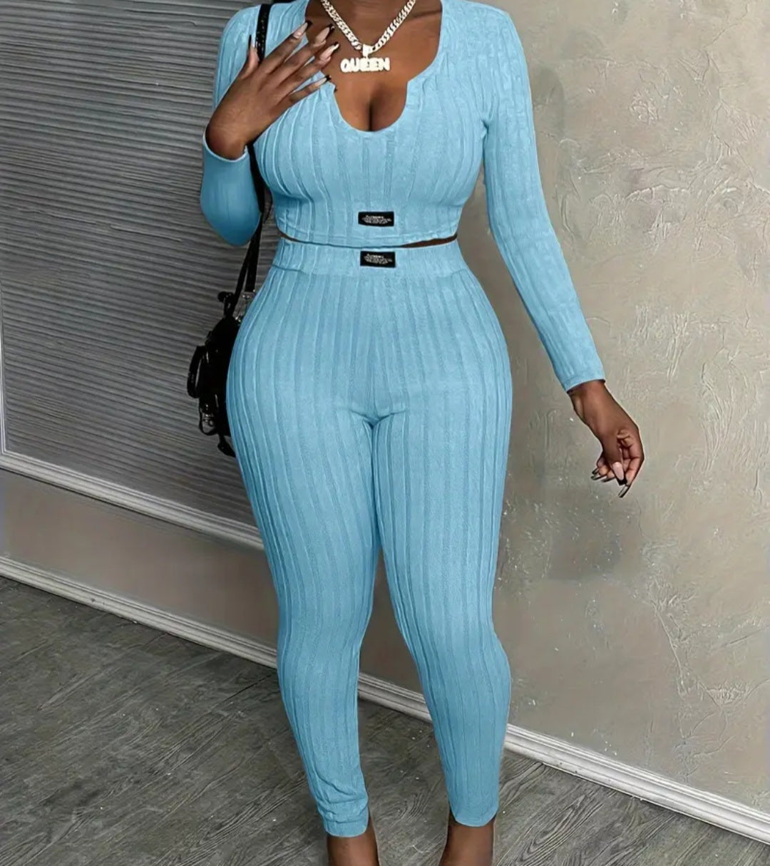 Women's Slim-Fit Long Sleeve Top & High-Waist Pants Set in light blue, featuring a stylish ribbed design and a flattering silhouette, perfect for casual outings.