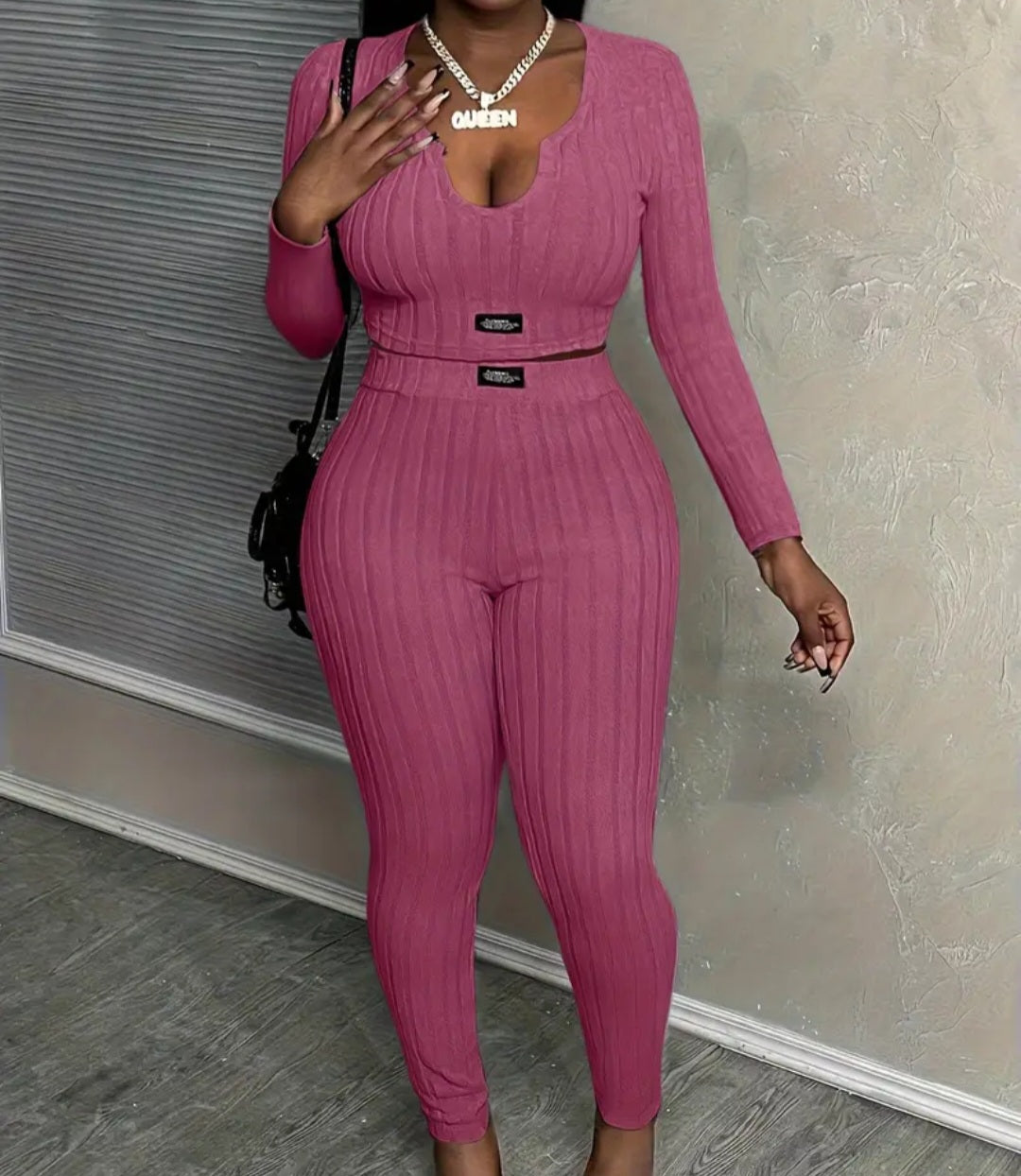 Women's Slim-Fit Long Sleeve Top & High-Waist Pants Set in pink, showcasing a fitted long sleeve top paired with high-waist pants, displayed against a stylish backdrop.