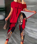 Trendy 2 Piece Chic Geometric Print Set featuring a slanted shoulder top in red with 'faith' design, paired with stylish slim-fit patterned pants that complement the outfit beautifully.