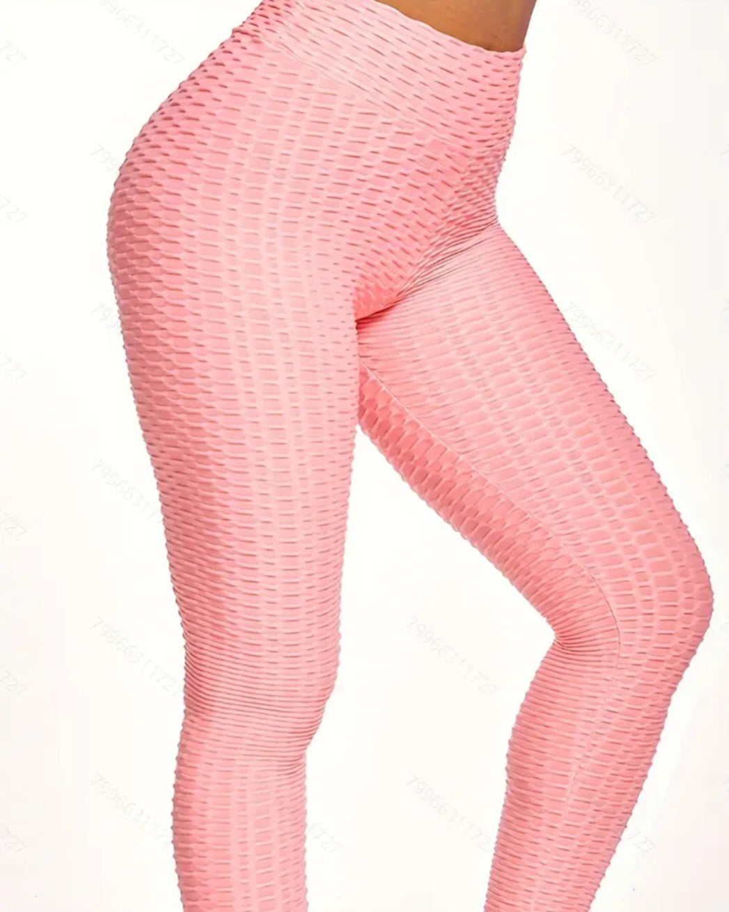Women's Solid Color Slimming Butt Lifting Yoga Pants - Honeycomb Activewear Leggings in soft pink, perfect for pairing with crop tops for a fashionable look.