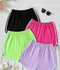 Girls 4-Piece Summer Knit Shorts Set featuring colorful athletic shorts in black, pink, green, and lavender, showcasing an elastic waistband and stylish design for casual wear.