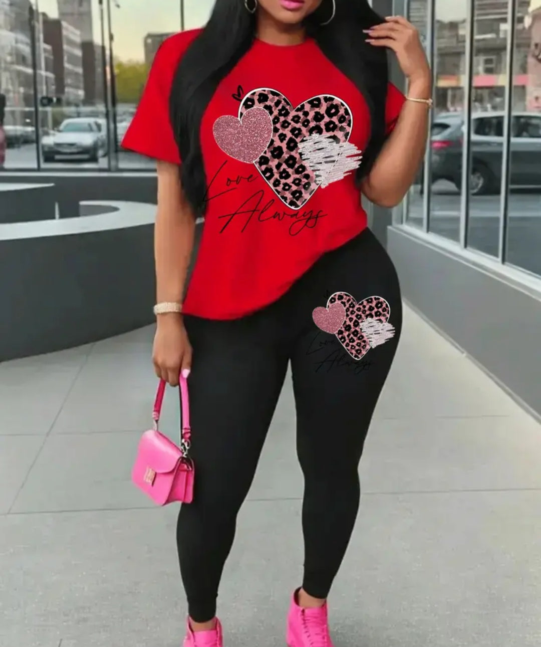 Women's Love Always Outfit in red, showcasing a stylish bohemian top with leopard heart design paired with sleek black bottoms, ideal for relaxed gatherings.