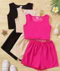 Girls Floral Vest and Shorts Set featuring a stylish soft cotton design in vibrant colors, perfect for ages 2-8. Includes a pink vest and matching shorts with comfortable fit for summer fun.